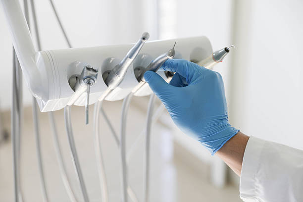Professional Tooth Extraction technician working in De Pue, IL